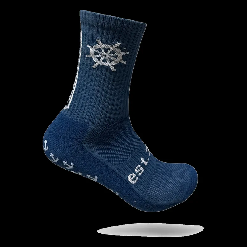 Navyblaue Gripsocke mit eingestricktem Steuerrad-Logo und Grip-Muster aus Ankern